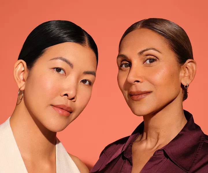 Two women smiling