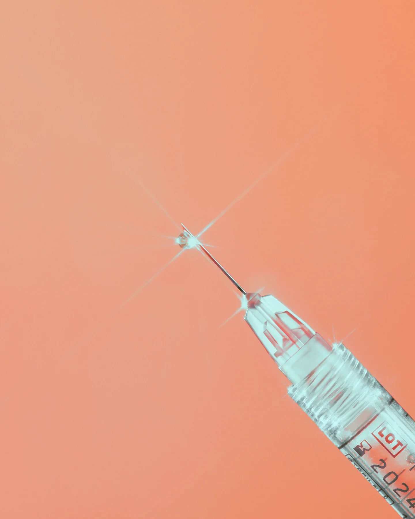 Syringe with a lens flare