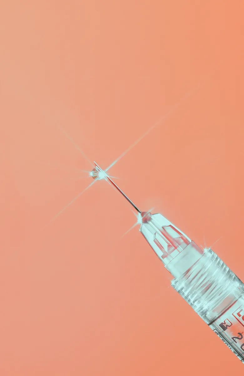 Syringe with a lens flare