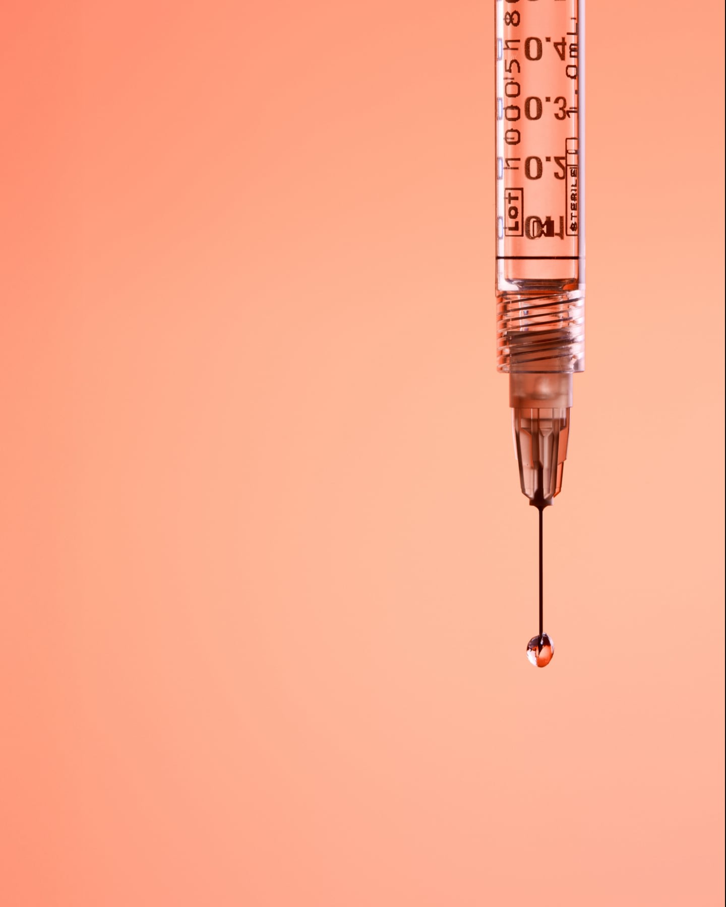 Syringe with droplet