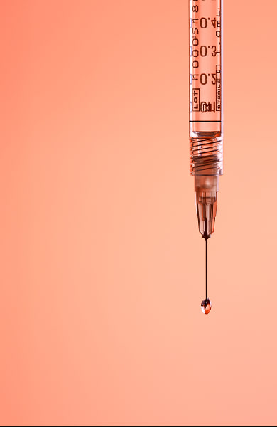 Syringe with droplet